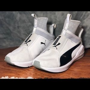 White and black Womens Kylie Jenner fierce pumas.